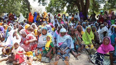 Women waiting to be seen by medical staff at the village of Quionga Cabo DelGado province in northern Mozambique where the Rwandan army set up a mobile clinic to treat people for the day. 